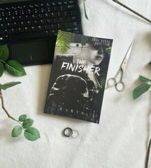 Book cover of "The Finisher" by RuNyx, featuring a dark, moody background with a shadowy male figure in a suit, partially obscured by smoke or mist. The title is bold and metallic, evoking intensity and mystery, with the author's name displayed below.