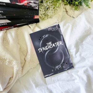 ''Book cover of The Syndicater by RuNyx, featuring a dark, moody design that reflects the intense themes of crime, romance, and redemption in the final installment of the Dark Verse series."